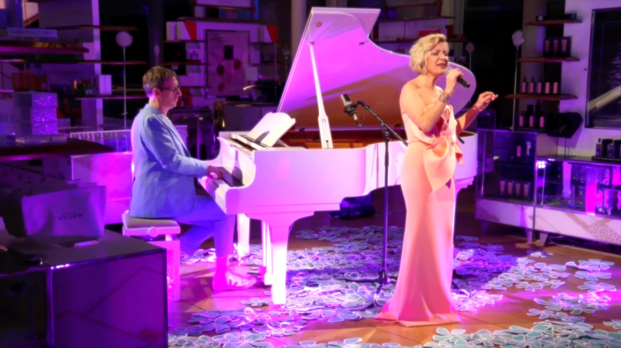 Natalie Dessay in a digital concert at Le Bon Marché Rive Gauche, accompanied on piano by Philippe Cassard