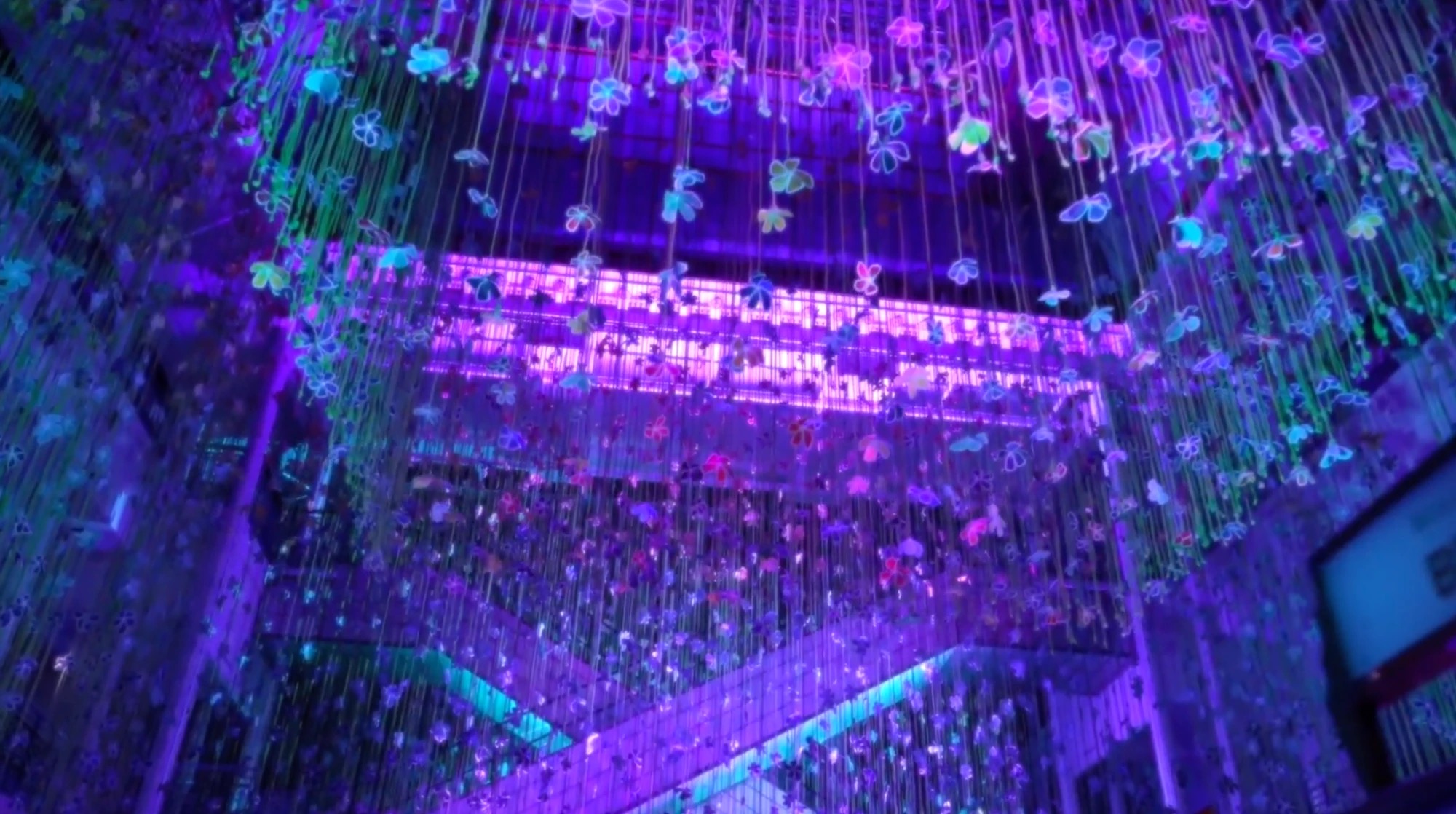 Luminous floral set of the “Porte-Bonheurs” exhibition during Natalie Dessay’s concert at Le Bon Marché Rive Gauche